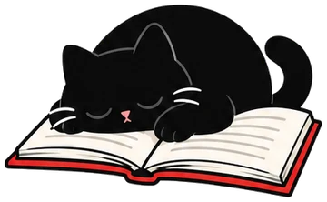 Noche the cat, asleep on an open book